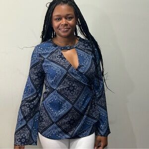 197. Doe & Rae NWT’s wrap front long sleeve blouse blue & black